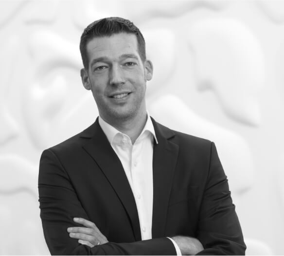 Black and white photo of Jan Merker, Chief Operating Officer at Brainlab