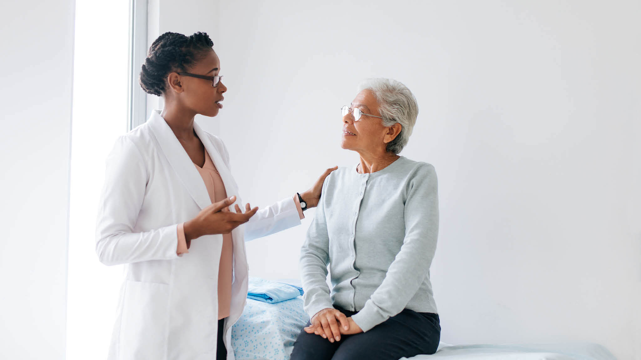 A doctor is having a conversation with a patient